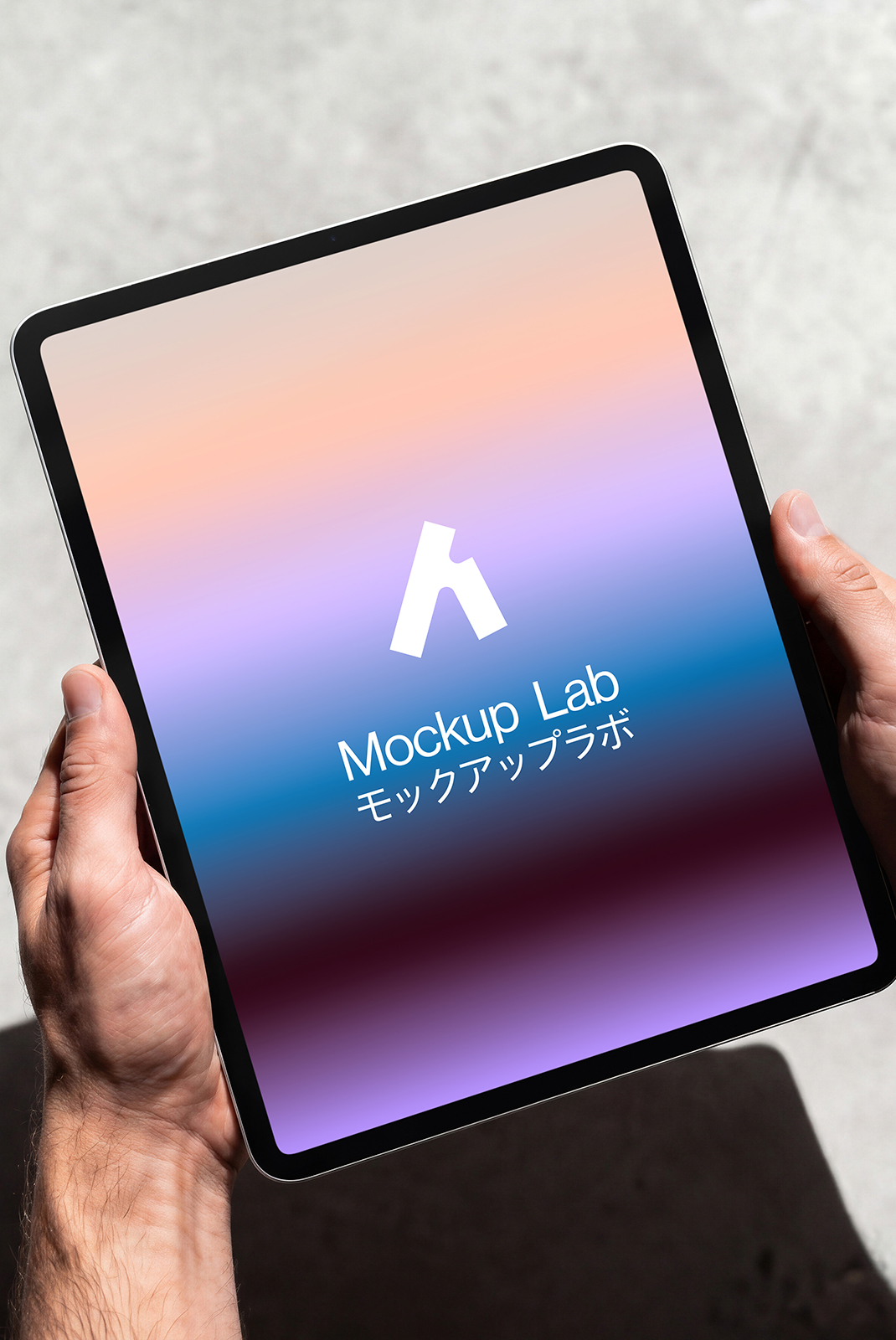 Close-up view of the iPad 02ML mockup displaying a vibrant app interface.